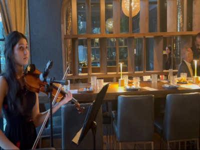 Sarah performing violin at BP's Birthday Party fundraiser